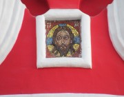 Образ Спаса во фронтоне окна центральной апсиды собора Воскресения Словущего в Андреевском монастыре в Москве.