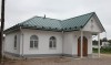 Церковный дом церкви Троицы Живоначальной в Острове Псковской области.
